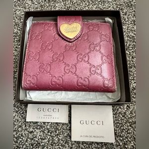 Gucci Raspberry Leather Logo Wallet.
